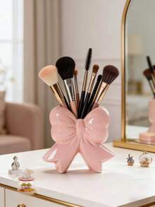 1 hộp đựng đồ trang điểm hình nơ xinh xắn - Hộp đựng cọ trang điểm và đồ dùng văn phòng để bàn, thiết kế hộp đựng cọ trang điểm trang nhã, lý tưởng cho các bạn gái, sinh viên và phụ nữ như một vật trang trí sáng tạo. - Nhiều màu - Xem 4