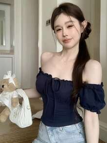 Áo thun ngắn tay tay cánh hoa thắt nơ kiểu dáng ngọt ngào và cay nồng, áo kiểu trễ vai cao cấp mới cho nữ mùa hè. - Xanh đậm - Xem 1