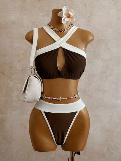 Bộ đồ bơi đi biển phối màu khối, khoét rỗng, kiểu dáng mới năm 2026, thích hợp cho kỳ nghỉ xuân/hè.