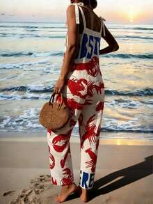 Bộ áo liền quần nữ dáng rộng, thoải mái, phối màu hình tôm hùm và chữ cái, phù hợp cho kỳ nghỉ xuân/hè thanh lịch. - Nhiều màu - Xem 9