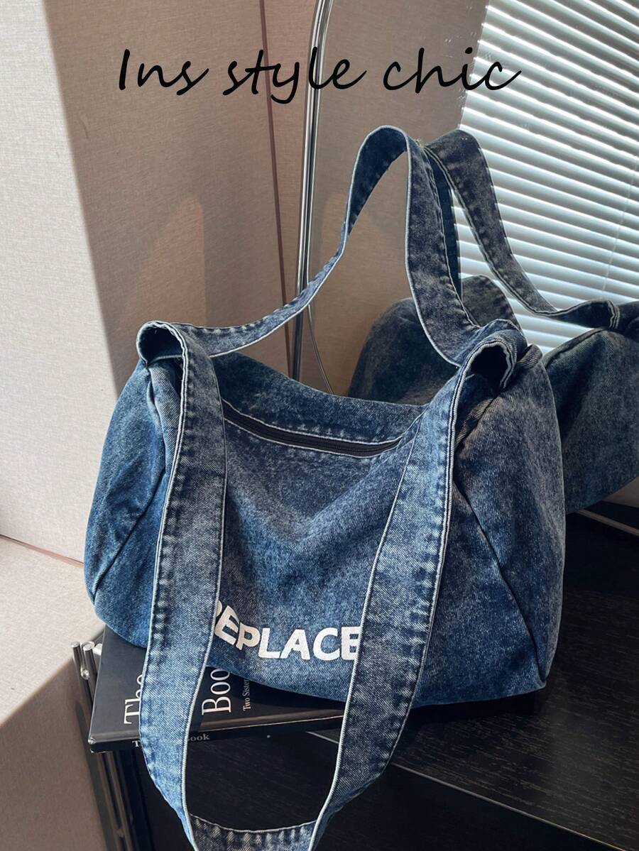 Este es un bolso de mano de mujer de color azul claro, de estilo de moda y sencillo, hecho de tela de mezclilla con un diseño de doble asa, adecuado para deportes al aire libre, ir al trabajo, ir de compras, vida universitaria y viajes cortos. - Azul - Ver 1