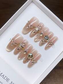 Unhas postiças prensadas feitas à mão, formato oval longo, design de olho de gato com gradiente dourado pintado à mão, arte de unhas minimalista elegante de alta qualidade com aplicação de strass, unhas suaves e fofas, unhas falsas criativas e exclusivas, arte de unhas diária, unhas de estilo moderno e fofo, adequadas para uso diário, unhas de primavera e verão, destacáveis e reutilizáveis, perfeitas para mulheres e meninas comparecerem a festas - Multicolorido - Visão 2