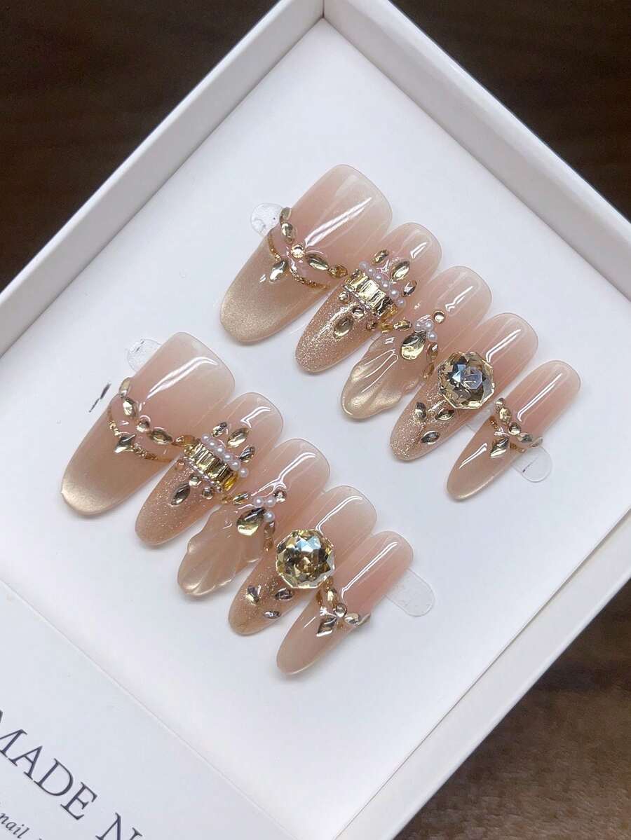 Unhas postiças prensadas feitas à mão, formato oval longo, design de olho de gato com gradiente dourado pintado à mão, arte de unhas minimalista elegante de alta qualidade com aplicação de strass, unhas suaves e fofas, unhas falsas criativas e exclusivas, arte de unhas diária, unhas de estilo moderno e fofo, adequadas para uso diário, unhas de primavera e verão, destacáveis e reutilizáveis, perfeitas para mulheres e meninas comparecerem a festas