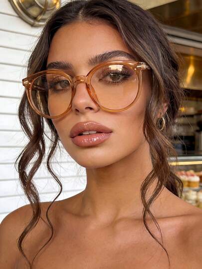 Kính thời trang gọng tròn lớn kiểu cổ điển màu vàng sâm panh, chất liệu nhựa, kiểu dáng giản dị, thích hợp đeo hàng ngày cho nam và nữ.