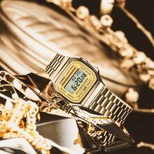 Casio Đồng hồ kỹ thuật số thời trang thể thao dành cho nam/nữ, dây đeo bằng thép không gỉ cổ điển, mặt vuông, lịch, báo thức và đồng hồ bấm giờ, khả năng chống nước cho cuộc sống hàng ngày, phù hợp để đeo hàng ngày A158WEA-9/A168WG-9W - Vàng và Đen - Xem 2