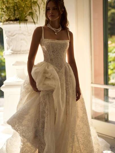 Square Neck Spaghetti Strap Lace A-Line Wedding Dress Elegant Vintage Bridal Gown For Casual Ceremony Daily Wear Engagement Party, Structured Lace Bodice With Clean Square Neckline Enhancing Collarbone And Neckline Shape, Delicate Spaghetti Straps Offering Light Support And Minimalist Appeal, Flowing Lace And Tulle Skirt Creating Soft Movement And Feminine Silhouette, Lightweight Construction Ensuring Comfort For Long Wear, Perfect For Civil Weddings, Outdoor Ceremonies, Travel Photoshoot, Bridal Shower, Daily Styling, Featuring Vintage Inspired Elegance, Soft Romantic Texture, Effortless Beauty, Ideal For Brides Seeking Relaxed Yet Refined Look With Grace And Lightness