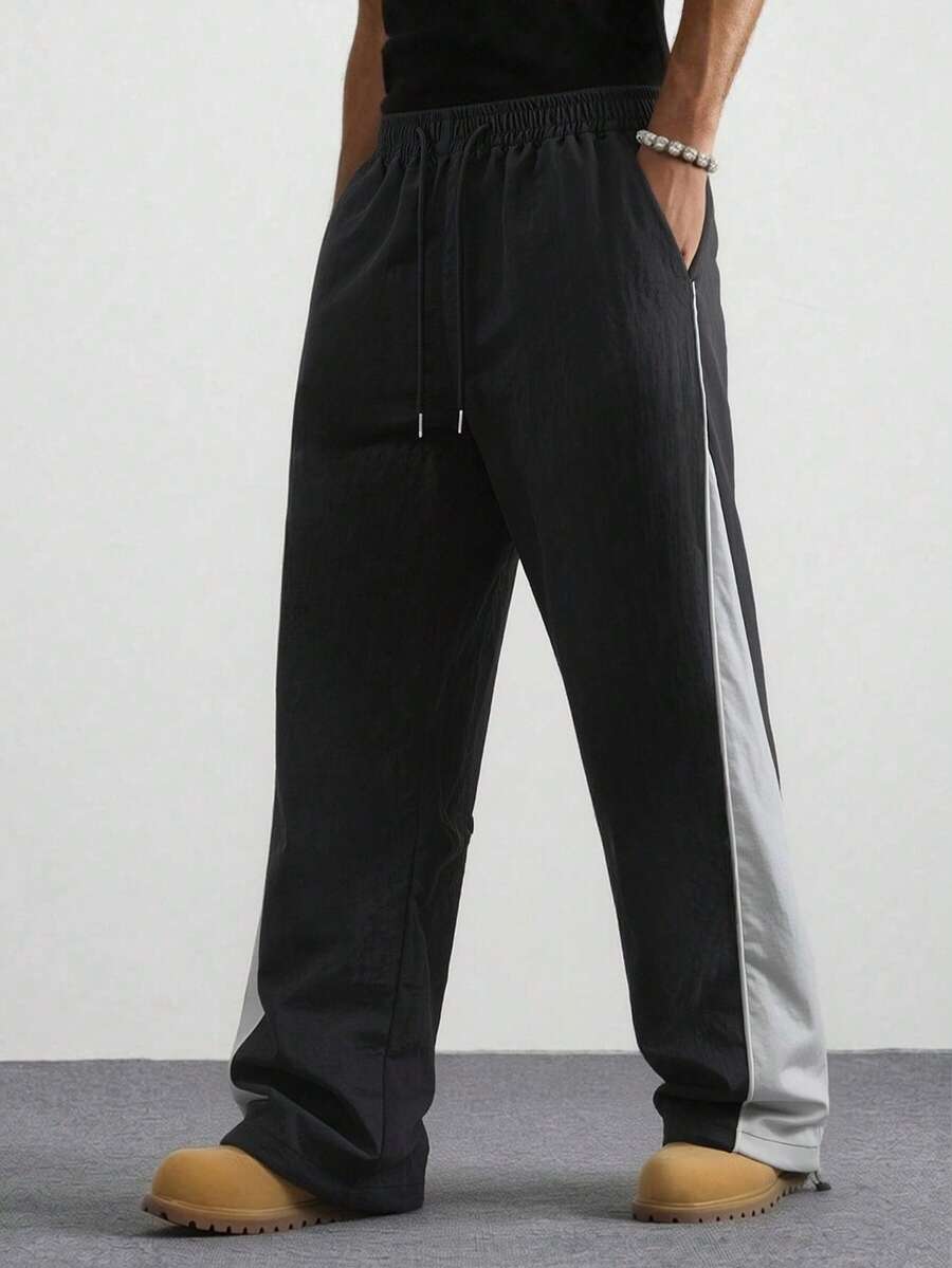 Pantalones de chándal rectos y holgados de estilo retro casual para hombres, diseño de bloques de color, primavera y otoño - Negro - Ver 1
