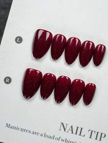 Bộ 10 móng tay giả ngắn hình hạnh nhân, làm thủ công hoàn toàn (bao gồm dụng cụ làm móng), màu đỏ đậm sang trọng với nhũ lấp lánh, bề mặt bóng mịn, thích hợp cho phụ nữ và bé gái sử dụng hàng ngày và dự tiệc. - Đỏ - Xem 2