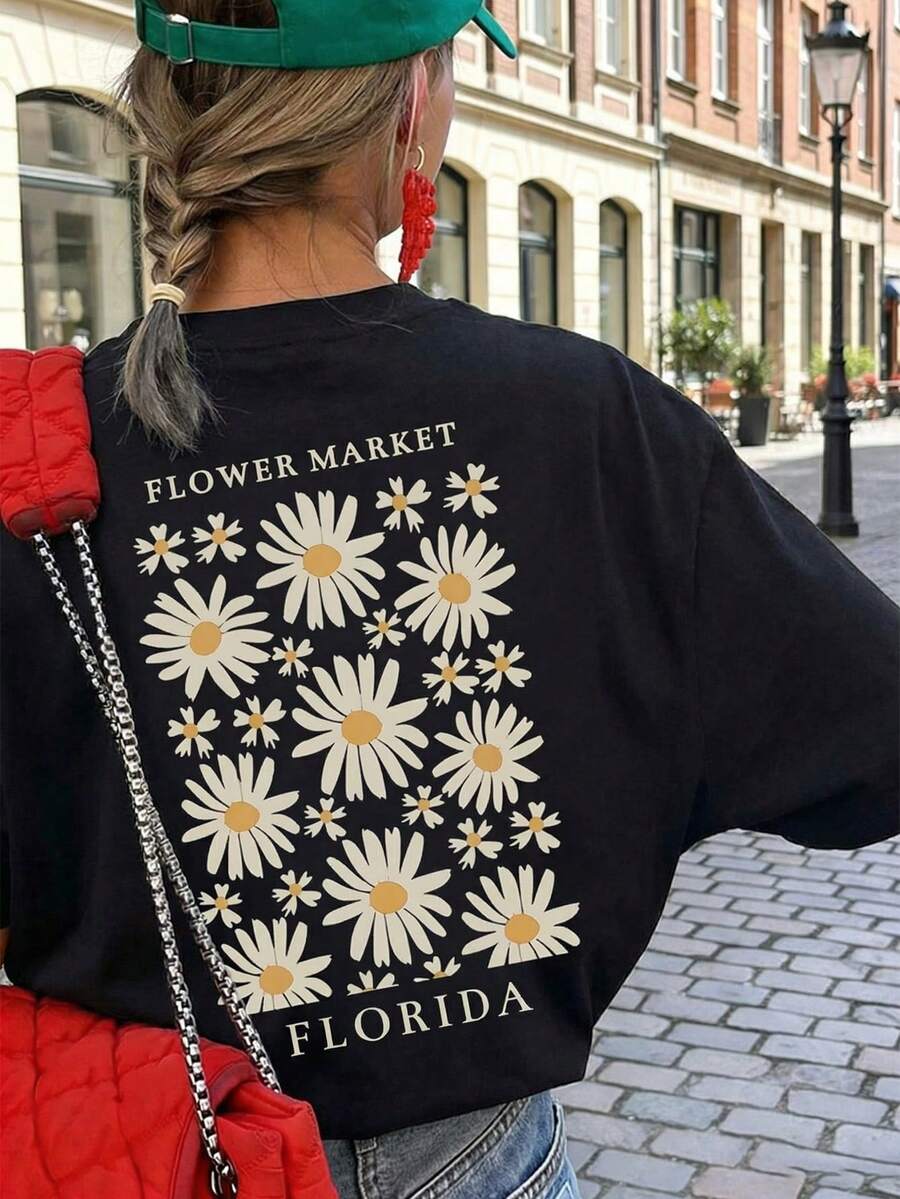 新款夏季女士简约向日葵花卉字母印花圆领短袖T恤，时尚百搭，适合女士上衣、度假和春季外出休闲穿着，黑色