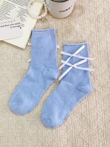 Đôi tất lửng màu xanh pastel ngọt ngào, có nơ và bèo nhún, dài đến giữa bắp chân, thích hợp cho mùa xuân/hè. - Nhiều màu - Xem 10