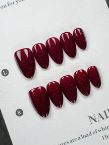 Bộ 10 móng tay giả ngắn hình hạnh nhân, làm thủ công hoàn toàn (bao gồm dụng cụ làm móng), màu đỏ đậm sang trọng với nhũ lấp lánh, bề mặt bóng mịn, thích hợp cho phụ nữ và bé gái sử dụng hàng ngày và dự tiệc. - Đỏ - Xem 8