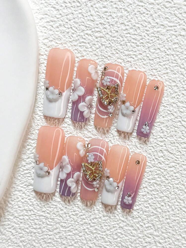 10件套法式手工美甲套装，包含凝胶美甲套装、手工白色3D立体花朵美甲配件（白色山茶花、镶嵌水钻的镂空蝴蝶、手绘白色波浪线、浅蓝色花朵、紫色和白色指甲油），适用于婚礼、日常、派对、摄影、休闲、办公等场合。套装内含美甲工具（1个果冻贴片+1个指甲锉），提供杏仁形、鸭嘴形、棺材形三种形状的美甲贴片。 - 彩色 - 查看 4