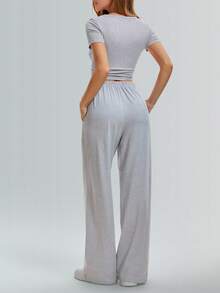 Speed mate Bộ đồ thể thao mùa hè 2026 dành cho nữ, gồm quần ống rộng và áo croptop xếp ly bên hông. - Xám - Xem 4