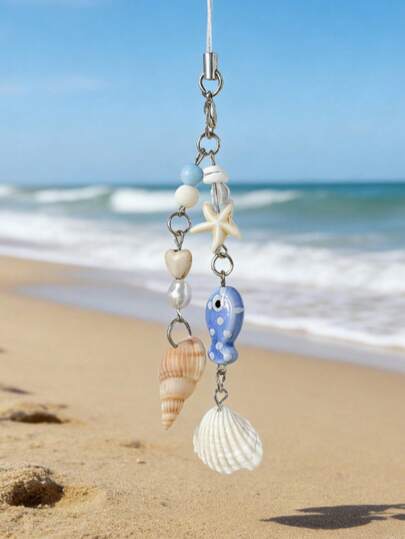 Cordón para teléfono con temática de peces de lunares en color azul pastel, con conchas naturales, estrellas de mar y cuentas de perlas falsas, colores de macarrón refrescantes que evocan las vibras de la playa de verano. Hecho de resina y materiales de concha natural, textura delicada, cordón colgante de metal, adecuado para varios teléfonos y bolsos