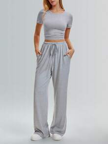 Speed mate Bộ đồ thể thao mùa hè 2026 dành cho nữ, gồm quần ống rộng và áo croptop xếp ly bên hông. - Xám - Xem 5