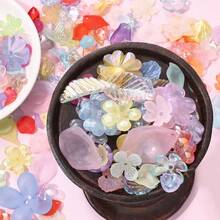30克/袋，混合花朵、花瓣、叶子、蝴蝶结，颜色和款式多样，适合装饰、情侣手链、手链、项链和手机链等饰品制作。 - 混合花卉 - 查看 5