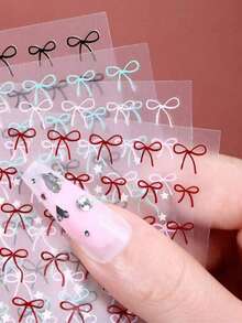 3D红色蝴蝶结星星图案自粘美甲贴纸，适合女士DIY美甲，情人节适用 - 彩色 - 查看 9