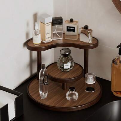Cet organisateur de maquillage, ce support de rangement pour coiffeuse, peut ranger les produits de soins de la peau, les cosmétiques, les pinceaux de maquillage, les parfums, etc. La conception multi-couches maximise l'espace vertical de la coiffeuse, permettant aux bouteilles et aux cosmétiques d'être rangés de manière ordonnée et organisée, disant adieu au désordre. Son apparence simple et élégante peut parfaitement s'assortir à n'importe quel style de coiffeuse et est un outil essentiel pour les femmes pour organiser leurs produits de beauté et créer une zone de maquillage rangée - particulièrement adapté aux coiffeuses avec un espace limité.