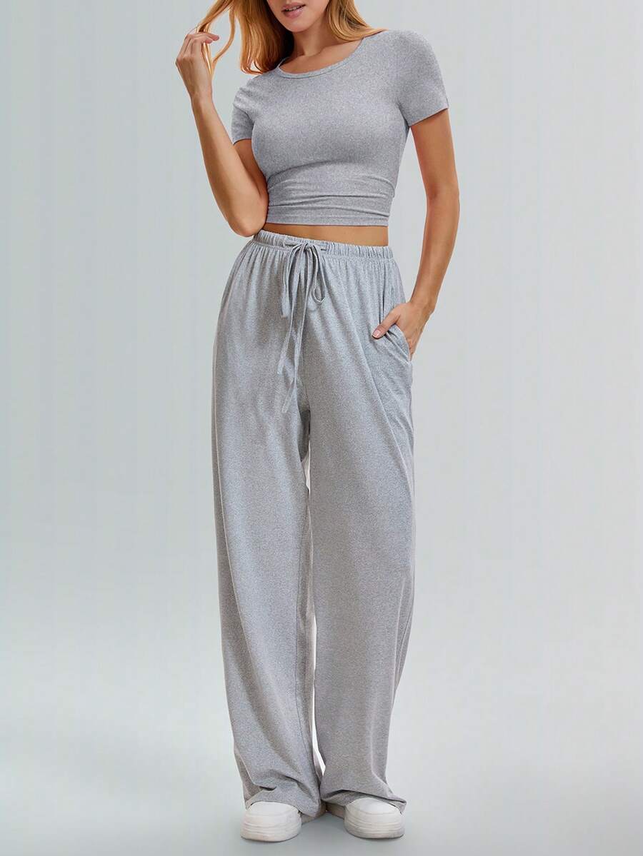 Speed mate Bộ đồ thể thao mùa hè 2026 dành cho nữ, gồm quần ống rộng và áo croptop xếp ly bên hông. - Xám - Xem 1