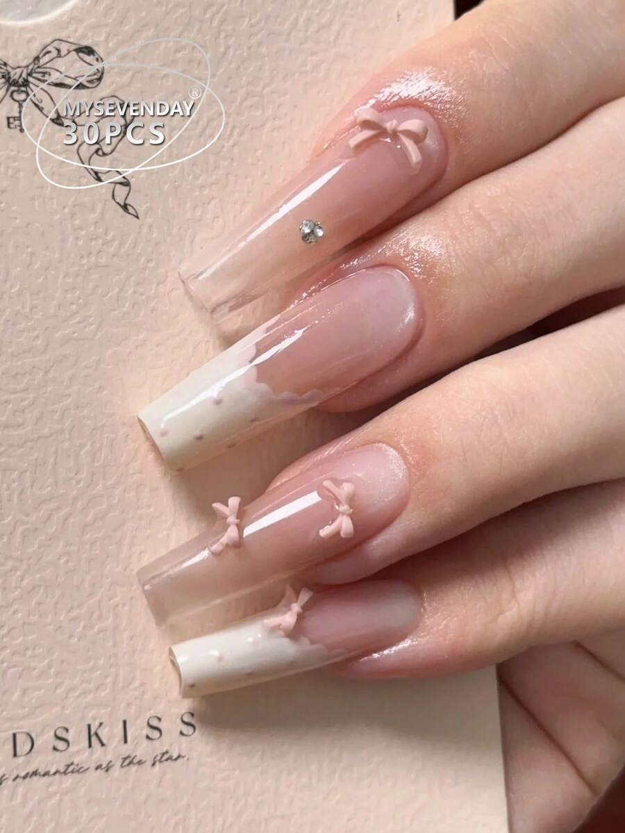 30 Móng giả dán siêu dài hình thang (hình chữ T) loại A/Kiểu dáng độc quyền Sweet Girl Ballet màu hồng nude với nơ, nền hồng nude trong suốt, kết hợp với màu trắng sữa kiểu Pháp, nơ ba chiều và họa tiết kim cương vỡ, mang phong cách nhẹ nhàng và tinh tế, toát lên vẻ quyến rũ thuần khiết của một cô gái ballet, hoàn hảo cho hẹn hò, đi làm hoặc phong cách ngọt ngào, trông trắng trẻo và dịu dàng. - Nhiều màu - Xem 1