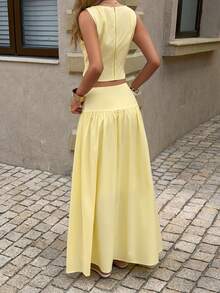 Unadoll 女士春夏法式休闲浅黄色两件套，纽扣细节无袖露脐上衣搭配高腰喇叭下摆长裙，适合度假和日常穿着。 - 黃色 - 查看 2