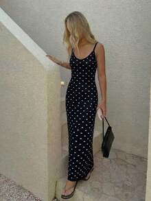 Đầm dệt kim chấm bi đen không tay HoloChill mới 2026 dành cho nữ, được làm từ chất liệu co giãn cao cấp, tạo vẻ ngoài tôn dáng cho mỗi ngày, thích hợp cho mùa hè, dự tiệc thanh lịch, đi biển hoặc dự đám cưới. - Đen và trắng - Xem 6