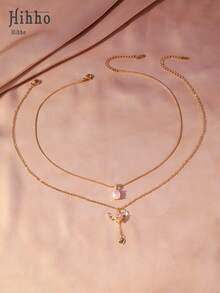 Hihho 两件套：椭圆形半透明柔光吊坠，简约蛇骨链增添优雅气质；心形翅膀吊坠镶嵌闪亮水钻，流苏设计，优雅别致。无论单独佩戴彰显精致品味，还是叠戴打造独特风格，这些项链都是表达您真挚祝福的绝佳礼物。 - 鎖骨鏈 - 查看 5