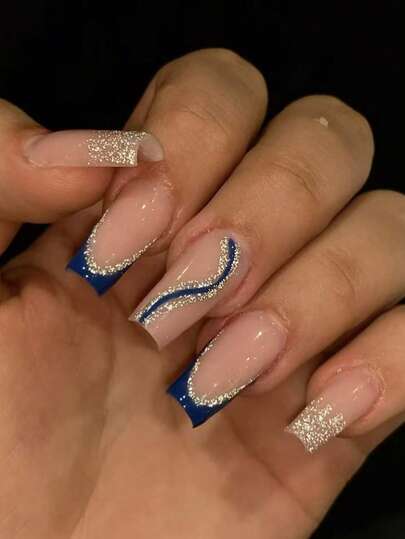 24pcs Long Coffin Shaped Acrylic Nail Tips, Blue & Gold Glitter French Pointed Nail Stickers. This Acrylic Nail Set Includes 1 Bottle Of Gel Polish And 1 Nail File. The French Manicure Style Is Suitable For Daily Wear, As Well As Parties And Clubbing Events For Women.
