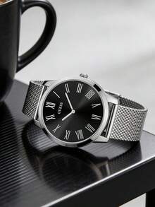 Guess Đồng hồ nam tối giản, dây đeo kim loại lưới màu bạc cổ điển thanh lịch, mặt số đen với chữ số La Mã, thiết kế mỏng nhẹ, phù hợp cho cả công sở và thường ngày. - Bạc - Xem 1