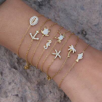 Uworld Sommer Urlaub Zirkonia Meerestier Armband für Frauen, 18K vergoldet Edelstahl wasserdicht Schildkröte Seestern Schmuck