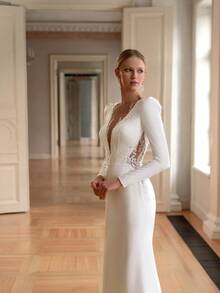 Elegant Crew Neck Long Sleeve Bishop Sleeve A-Line Gown In Luxe Satin – Captivating Floor-Length Dress Featuring A Refined Crew Neckline And Dramatic Bishop Sleeves That Add Volume And Grace. The Classic A-Line Silhouette Flows Beautifully From The Fitted Bodice, Creating A Sophisticated Look Ideal For Formal Occasions. Versatile Enough For Spring Bridal Events, Autumn Fundraising Galas, Or Winter Formals, Its Timeless Design Complements Pearl Jewelry And Heels Beautifully. Suitable For Black-Tie Affairs, Rehearsal Dinners, And Upscale Resort Evenings Where Sophisticated Style Commands Attention Without Compromise. The Smooth Satin Finish Adds A Touch Of Luxury To Every Movement. - trắng - Xem 2