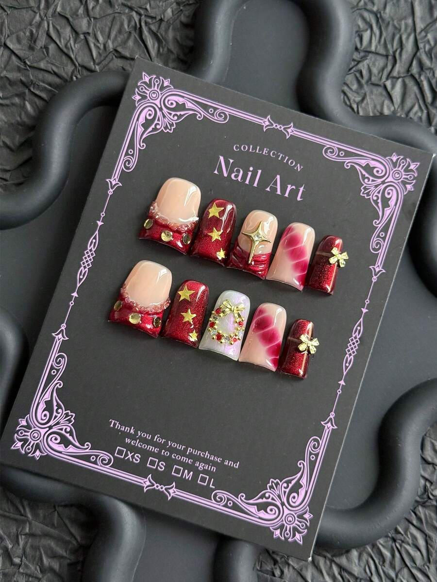 Y2K 10片装手工美甲贴纸,节日主题。鸭嘴形美甲贴纸,饰有花环、红色猫眼石、五角星和蝴蝶结等金色闪粉装饰。中等长度,适合角色扮演派对、日常佩戴、参加音乐会、DIY美甲等场合,包含工具套装。杏仁形指甲。手工美甲贴纸。假指甲。美甲用品。 - 紅色 - 查看 1