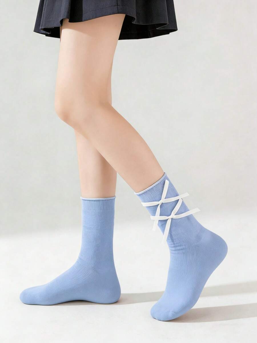 Đôi tất lửng màu xanh pastel ngọt ngào, có nơ và bèo nhún, dài đến giữa bắp chân, thích hợp cho mùa xuân/hè. - Nhiều màu - Xem 1