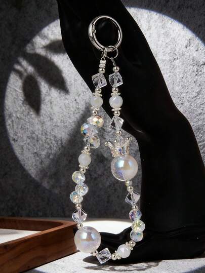 1条奢华皇冠炫彩串珠手机挂绳，多面水晶防丢手机带，少女风手机腕带（由于拍摄角度和放大倍数，实际尺寸可能与照片略有不同）