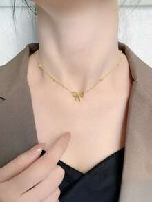 1 chiếc vòng cổ nơ tối giản thời trang dành cho nữ, thiết kế đa năng, vòng cổ ôm sát tinh tế và sang trọng. - Vàng 2 - Xem 1