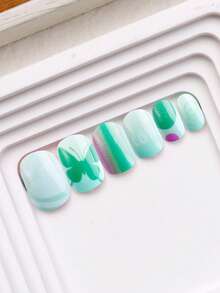 NAIO 24 piezas de uñas postizas para niños, uñas postizas de cobertura completa de corta duración con patrones de mariposa, corazón y lunares en degradado verde, un kit de uñas colorido y con diseños lindos con caja de almacenamiento y lima de uñas - Multicolor - Ver 4