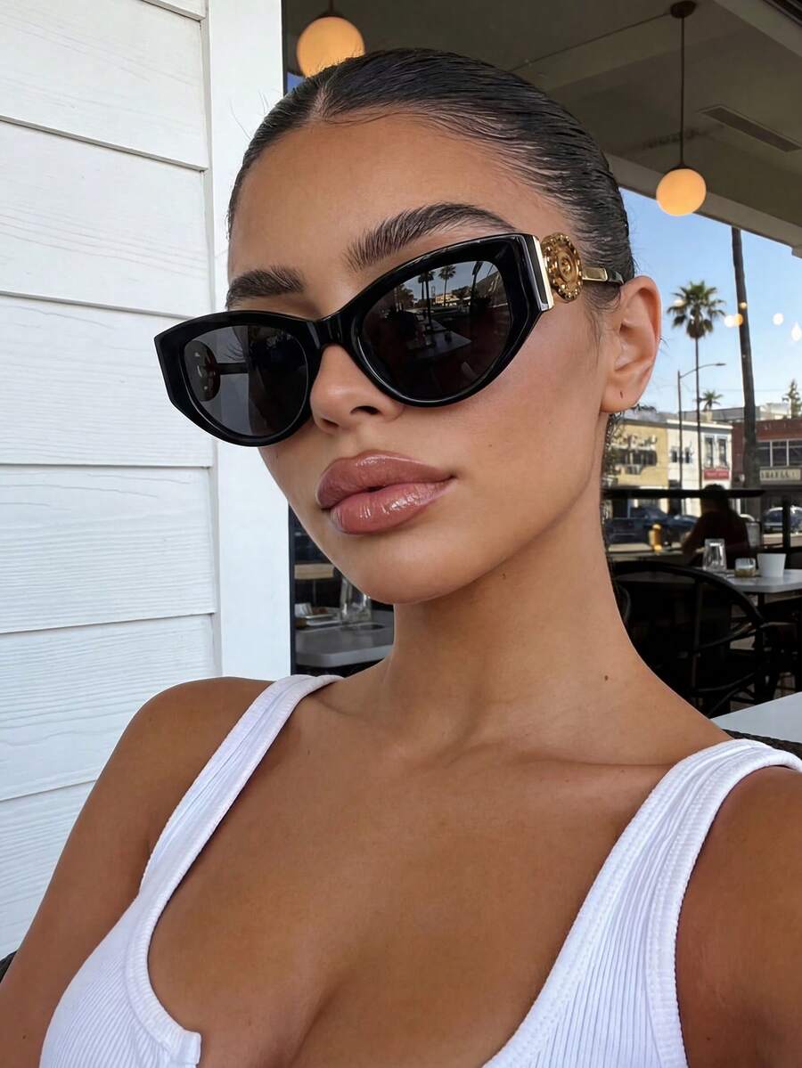 Lunettes de soleil chat noir pour femmes, lunettes de mode rétro en plastique, design classique pour les sorties, les voyages, la plage, les vacances et le port décontracté. Lunettes de conduite offrant une protection UV unisexe pour l'été - Noir - Voir 1