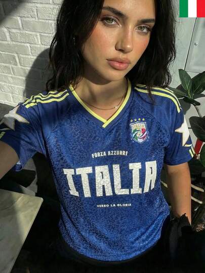 Camiseta larga de mujer de punto de malla italiana de ajuste holgado con cuello en V, estampado de bandera en todo el diseño, estilo Blokette Blokecore, transpirable y refrescante, para usar en verano y primavera