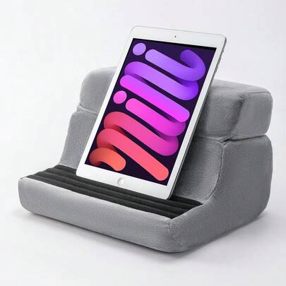 1个多功能平板电脑支架可折叠阅读枕，4档角度可调，平板电脑/手机支架枕，带收纳袋，便携式午睡枕，适用于家庭办公、追剧、阅读、旅行等多种场合。