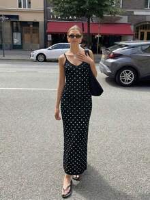 Đầm dệt kim chấm bi đen không tay HoloChill mới 2026 dành cho nữ, được làm từ chất liệu co giãn cao cấp, tạo vẻ ngoài tôn dáng cho mỗi ngày, thích hợp cho mùa hè, dự tiệc thanh lịch, đi biển hoặc dự đám cưới. - Đen và trắng - Xem 5