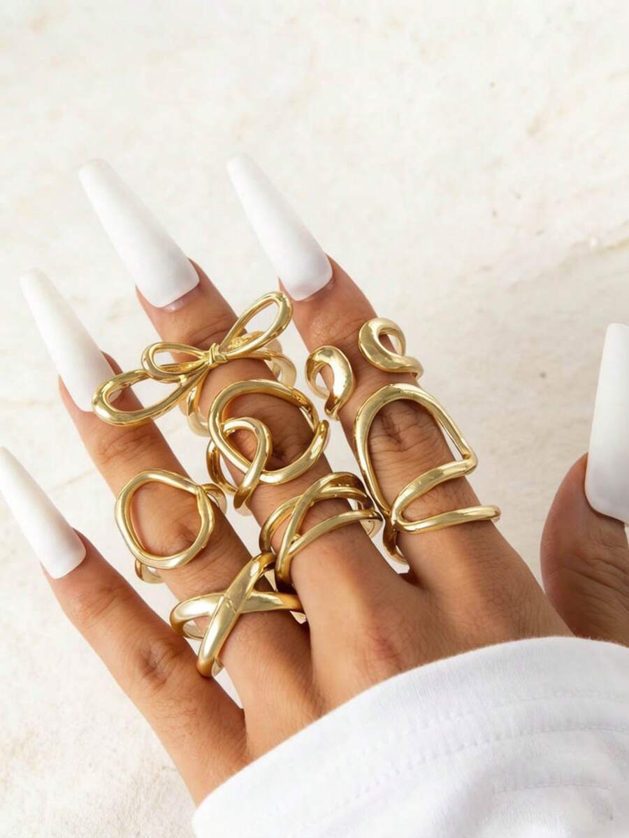 Bộ 7 chiếc nhẫn hợp kim kẽm tối giản thời trang, hình nơ bất đối xứng, thích hợp làm quà tặng trang sức để đeo hàng ngày.