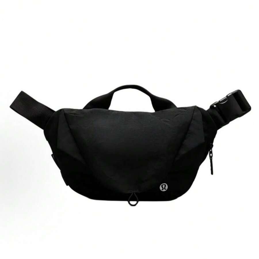 Lululemon Curved Crossbody Bag 3L | Ergonomic Half-Moon Silhouette | Water-Repellent High-Density Nylon | Interior Organization Pockets | Adjustable Strap For Custom Fit | The Ultimate Minimalist Essential - Black - View 1