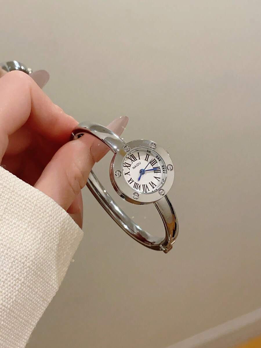 1 chiếc đồng hồ nữ mặt oval màu bạc đen, viền vàng, máy quartz, kiểu dáng thường ngày, phù hợp để đeo hàng ngày. - trắng - Xem 1