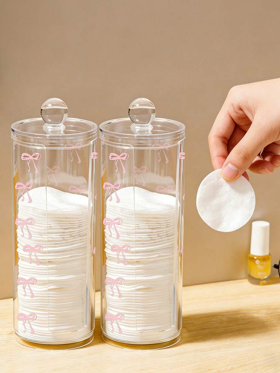 Boîte de rangement cylindrique à grande capacité avec motif transparent rose à nœud et cœur. Lavable et facile à nettoyer. Convient pour ranger de petits outils de beauté tels que tampons de coton, tampons démaquillants, cotons-tiges, ruban pour paupières doubles, éponges de beauté et éponges de nettoyage. Organisateur de bureau. - Multicolore - Voir 1