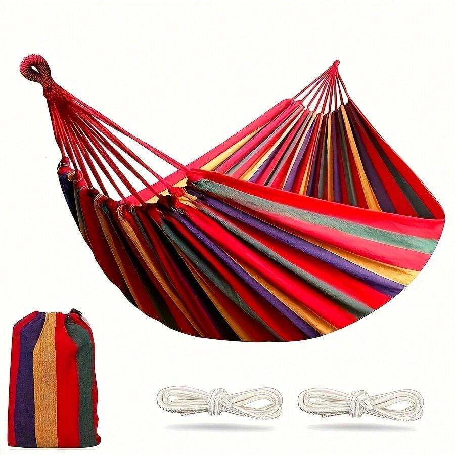 Hamaca portátil de tela colorida con diseño antivuelco. Incluye correas y bolsa de transporte. Ideal para acampar al aire libre y en interiores. Hamaca portátil de rayas vibrantes con bolsa de transporte y cuerda para un descanso confortable. Imprescindible para viajes al aire libre, relajación en el jardín, acampada, jardín y para disfrutar de la terraza.