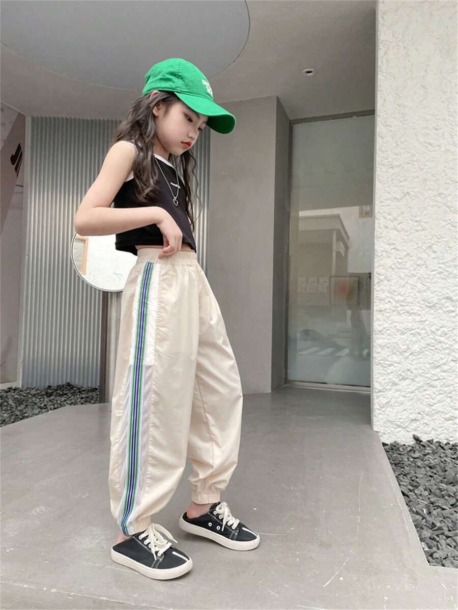 Quần nỉ thể thao sọc túi bên hông cho bé gái tuổi teen - Màu be - Xem 1