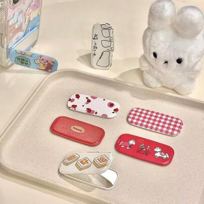 一套卡通星童格子手机壳，带镜面支架和可折叠隐形支架