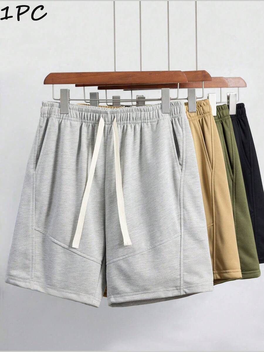 Quần short thể thao nam dáng rộng, thoải mái, phù hợp cho tập thể dục, bóng rổ, tập luyện, chạy bộ, tập luyện, dạo phố, cắm trại, bãi biển. Thiết kế cạp chun co giãn với dây rút điều chỉnh, thích hợp cho mùa hè. - Màu Xám nhạt - Xem 1