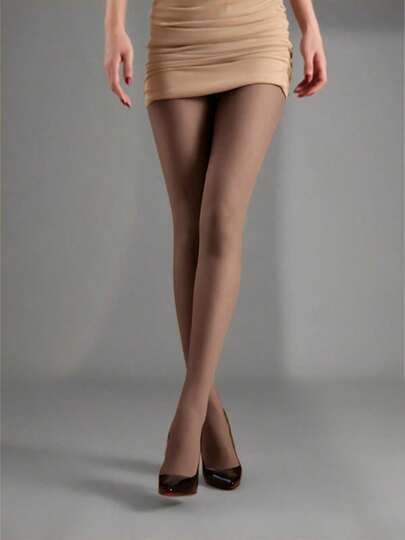 El panty de invierno transparente - En tono cálido desnudo, combinando el encanto transparente con la comodidad térmica acolchada