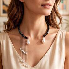 Dây chuyền cổ choker bằng thủy tinh đen trơn với mặt dây chuyền ngọc trai kim loại, dây chuyền tua rua ngọc trai nhiều lớp sang trọng. - Nhiều màu - Xem 5